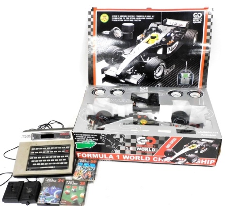 A Philips G7000 gaming console, with some games, and a Formula 1 World Championship radio controlled car.