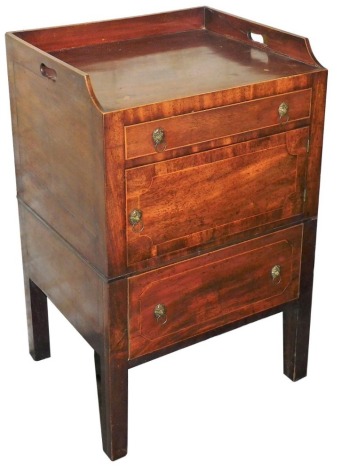 A 19thC mahogany and boxwood strung side cabinet, the raised back with side handles above three drawers, on square section legs, previously a night commode, 89cm high, 56cm wide, 48cm deep.