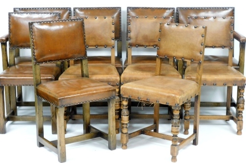 A harlequin set of ten Jacobean style oak dining chairs, with tan leather backs and over stuffed seats, raised on chamfered square legs united by H frame stretchers, comprising pair of carvers and four single chairs, together with four Inglesants single c