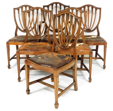 A set of six Hepplewhite design shield back dining chairs, with leather drop in seats, raised on tapering square legs and spade feet, united by an H frame stretcher, comprising a carver and five single chairs, 97cm high.