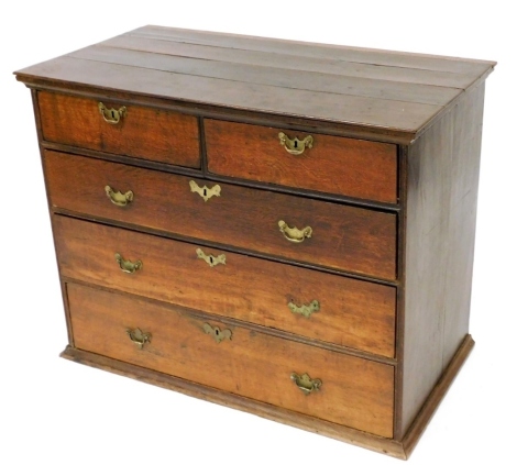 A late 18th/early 19thC oak chest, of two short and three long drawers, 76cm high, 95cm wide, 50cm deep. (AF)