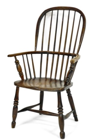 A 19thC ash and elm Windsor chair, with spindle turned back, solid seat, on a H stretcher. (AF)