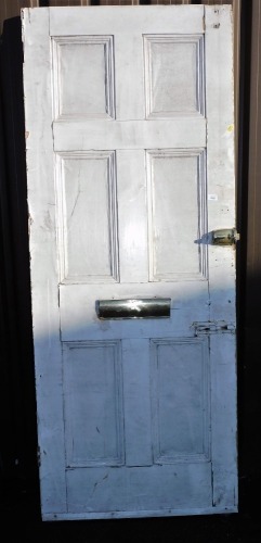 A painted panelled door, 193cm x 82cm.