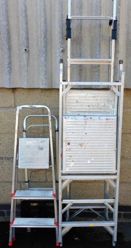 Metal step ladders. (a quantity)
