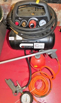 A Sip Industrial Airmate 05295 6 compressor, 230 volts, a spray gun and a pressure gauge.