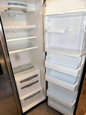 A Maytag American style fridge freezer, with ice dispenser. - 4