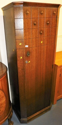 A mid 20thC oak single wardrobe, 179cm high, 73cm wide, 44cm deep.