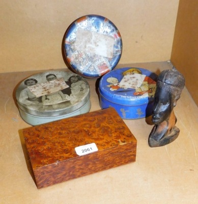 Various treen etc., an early 20thC burr wood box, 20cm wide, tribal art bust of a gentleman, 15cm high, and three tins containing jigsaw puzzles. (AF)