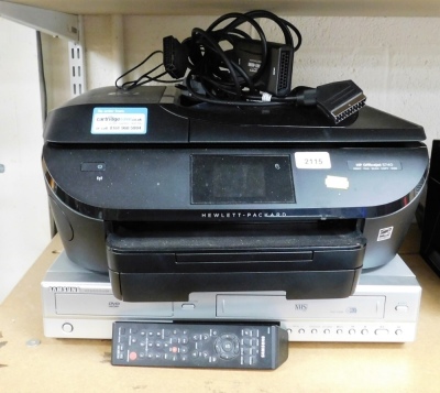 A Hewlett-Packard HP Officejet printer, 5740, and a Samsung VCR and DVD player.