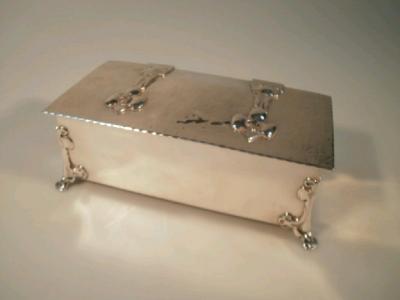 An Edward VII silver cigarette box