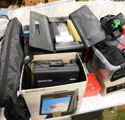 Various camera related equipment, to include a Lumix FZ38 camera, a Nikon Coolpix digital camera, tripods, a Diastar 200 large size slide viewer, boxed, projector, combination briefcase, Netgear router, various cabling, etc. (a quantity) - 5