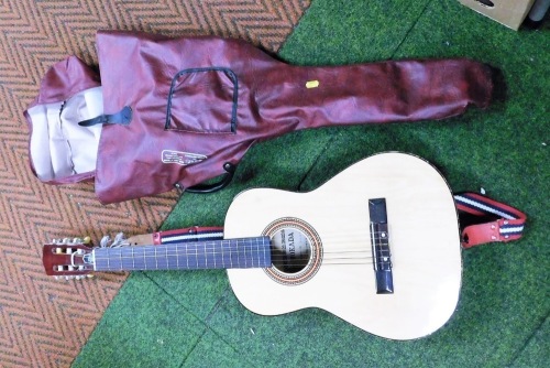 A Hokada acoustic guitar, model number 3337.