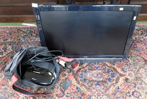 A Bush 31" flat screen television, model number E28M2NBWNH3NNT, a Manhattan freeview play box, etc.