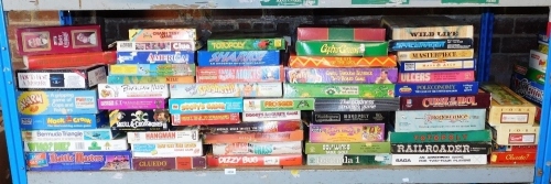 Various board games, Totopoly, Space Trader, Sharks!, America In A Box, Hook The Crook, Battle Masters, Cluedo, Dizzy Bug, Sooty's Game, etc. (1 shelf)