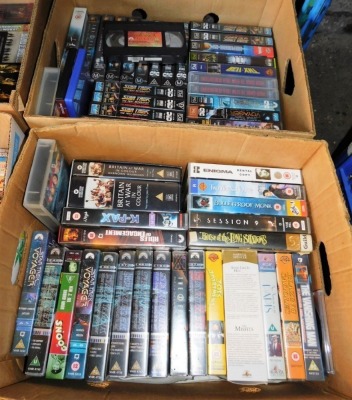 Various DVDs, VHS tapes, etc., to include Star Trek Voyager, The X Files, Invictus, The Wedding Date, 27 Dresses, War of The Worlds, etc. (a large quantity) - 4