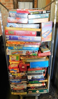 Various board games, puzzles, etc., to include Christmas Party Jigsaw Puzzle, Risk, Transformers, Buffy The Vampire Slayer Board game, Cluedo, Dial Away, Dare, Travel Go, etc. (contents of 1 cage)