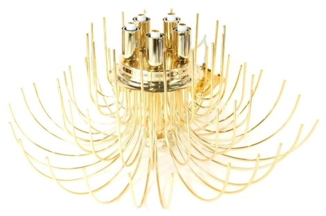 A Murano glass chandelier, composed of multiple clear and gold coloured flecks, with pendant drops and in a gilt coloured frame, 55cm diameter.