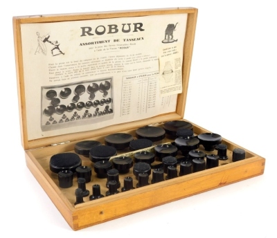 A 20thC Robur Assortment De Tasseaux cased watchmaker's kit, with a selection of case removers, in a fitted box, 32cm wide.