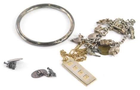 A silver charm bracelet, with heart shaped clasp, and various charms, heart 2cm wide, etc., a hollow bangle, ingot, pair of Lincoln Imp cuff links. (a quantity)