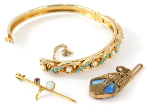 A fancy bangle, set with turquoise and claw set with pearls, marks rubbed, a bar brooch and an Art Nouveau pendant with compressed oval top, 3cm high. (3, AF)