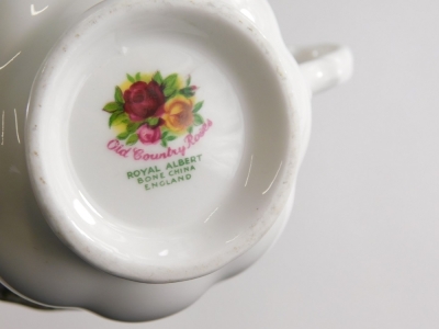 Auctioneer Announce: IN ORIGINAL BOX and circa 1962. A boxed Royal Albert Old Country Roses part tea service, to include serving plate, 21cm wide, cups, saucers, etc., printed marks beneath. (a quantity) - 2