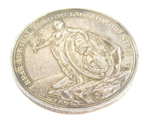 A Victory of The Nile Davison tribute commemorative silver medallion, August 1st 1798, with The Admiral Lord Nelson of the Nile title, 5cm diameter. (AF)