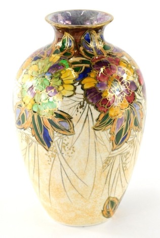 A 20thC Royal Winton vase, of shouldered circular form, lustre decorated and gilt highlighted with flowers, printed marks beneath, 25cm high.