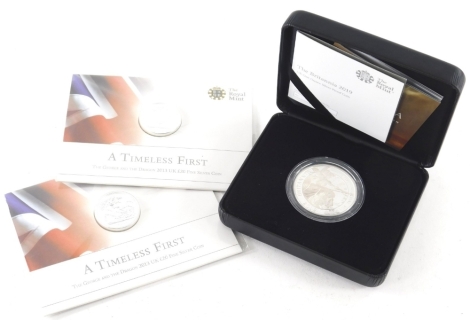 A Britannia Spirit Of A Nation silver proof coin, 2019, boxed with paperwork and two Timeless First £20 silver coins in card and plastic wrappers. (3)