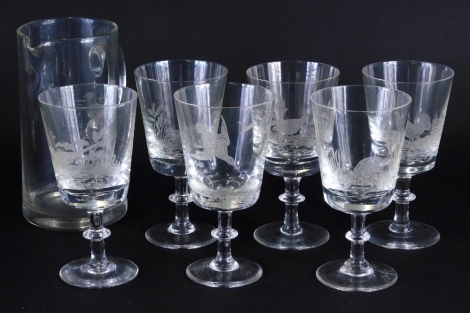 A 20thC drinks set, comprising jug and six glasses, 16cm high, each etched with birds in a country scenes, unmarked. (7)