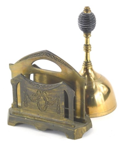 An Austrian Art Nouveau metal desk tidy, of small proportion marked Geschutzt real Bronze and a Regency style hand bell of small proportion, 17cm high. (2)