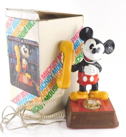 A boxed Mickey Mouse telephone, 35cm high.