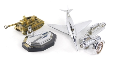 A chrome plated aeroplane Art Deco table lighter, presented to Oliver Gomersall RAF Batley, 22cm wide, ship lighter and other cannon marked Tom Martin and Company and a brass tank lighter. (a quantity)