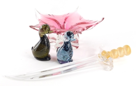 A Murano type floral headed bowl in pink and clear glass, 30cm wide, two glass duck ornaments and a Murano type glass sword. (4)