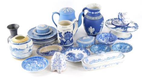 Various blue and white pottery, Jasperware, dark blue jug with beak spout, 19cm high, light blue Wedgwood Jasperware, other blue and white pottery, egg stand, etc. (a quantity)