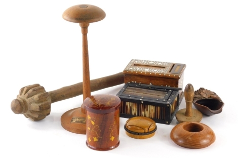 Various treen, a knobkerrie, a stand made from the teak of HMS Iron Duke, Jutland 1916, 29cm high, inlaid cigarette dispenser, porcupine cigarette dispenser, darning mushroom, etc. (a quantity)