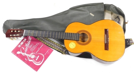 An Angelica Japanese acoustic guitar, number 2852. (cased)