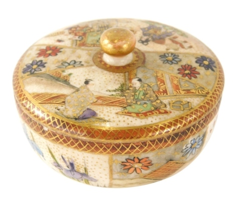 A 19thC Satsuma jar and cover, of small proportion, profusely decorated with flowers and gilt highlights, unmarked, 5cm high.