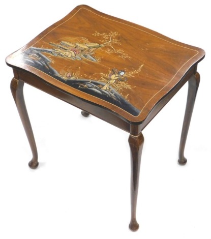 A 20thC Japanese style walnut side table, the serpentine rectangular top raised with figures of geisha before trees and building, on cabriole legs, terminating in pad feet, 52cm high, 52cm wide, 42cm deep.