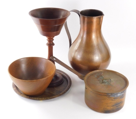 Various treen, etc., a large copper jug of bulbous form, with shaped handle, beak spout and circular foot, 43cm high, pan and lid with iron handle, wooden Worthington tray, etc. (a quantity)