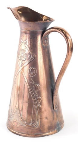 An early 20thC Joseph Sankey & Sons solid copper Art Nouveau jug, of trumpet form, raised with lotus flowers, with shaped handle, marked beneath, 35cm high.