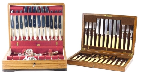 An early 20thC oak cased canteen of entree knives and forks, by Mappin & Webb, the oak canteen 35cm wide, and a further part canteen of plated cutlery.