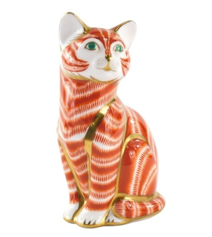 A Royal Crown Derby paperweight ornament, seated cat, silver stopper 13cm high.