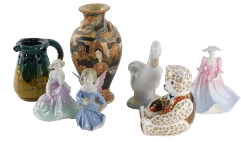 Various pottery and effects, late 19thC Japanese Satsuma vase decorated with many figures with raised moulded dragon, marked beneath, 19cm high, a Royal Crown Derby teddy bear paperwight ornament, Coalport figure Fascination, Studio Pottery Torquay style 