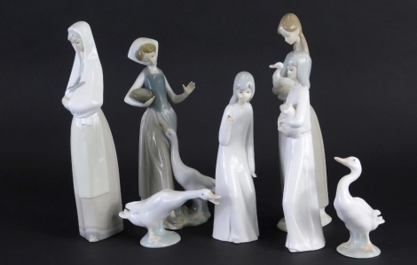 Various Lladro and Lladro type figures, to include a farm hand holding eggs aside goose, 25cm high, marked Lladro, various others, Nao, etc. (a quantity)