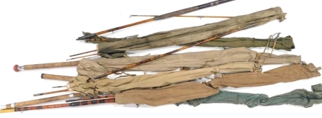 Various early 20thC split cane fishing rods, James Aspindale canvas case, various three piece and two piece split cane fishing rods, Black Seal two piece rod, various others, etc. (a quantity)