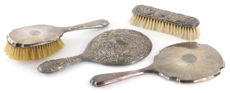 A harlequin dressing table set, to include matched hand mirror, hair brush, clothes brush and a further circular hand mirror, various dates and marks, each hand mirror approx 27cm high. (a quantity)