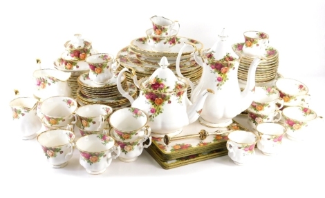 A comprehensive Royal Albert Old Country Roses part dinner service, to include dinner plates, 25cm diameter, bowls, teapot, coffee pot, gravy boat, sauce boat, place mats, bread/serving dish, cups, cake stand, etc. (a quantity)