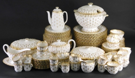 A comprehensive Spode Fleur de Lys dinner service, to include a pair of lidded tureens, 27cm wide, soup tureen, oval serving plate, gravy boat on stand, coffee pot, teapot, dinner plates, side plates, soup bowls, cups, saucers, plates, etc., printed marks