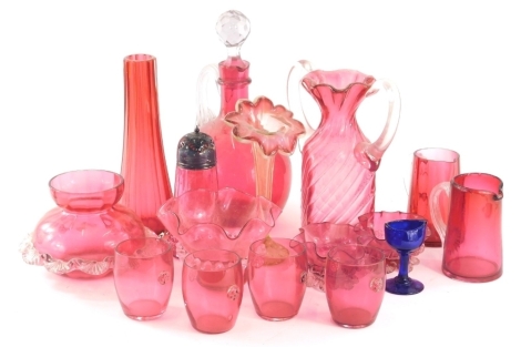 Various cranberry and ruby glass items, early 20thC and other, decanter with plain handle and stopper, 29cm high, continental floral flower vase, sifter, Bristol blue style eye glass, etc. (a quantity)