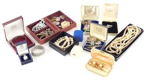 Various jewellery and effects, a silver bangle, silver bi coloured fob, various costume jewellery and effects, horse head brooch, etc. (a quantity)